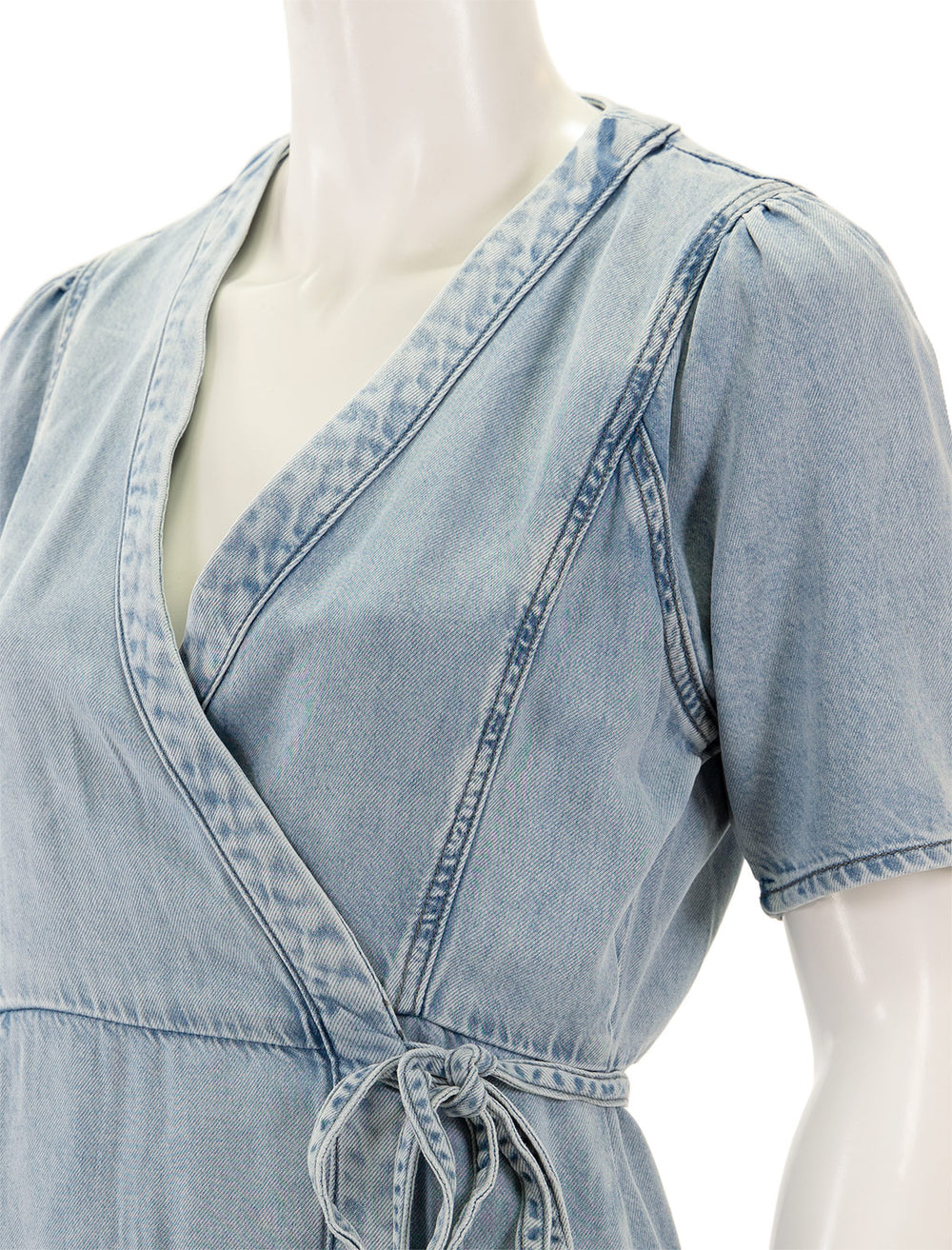 Close-up view of Suncoo Paris' cilem denim dress.