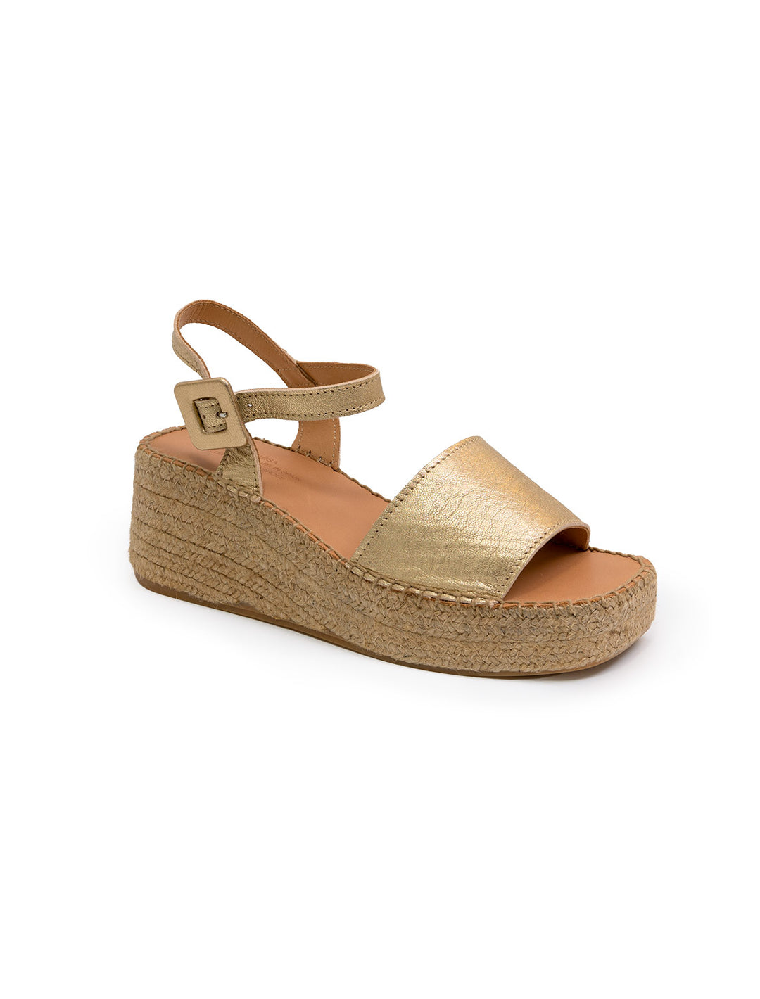 Front angle view of Naguisa's rall espadrille wedge in metallic gold.