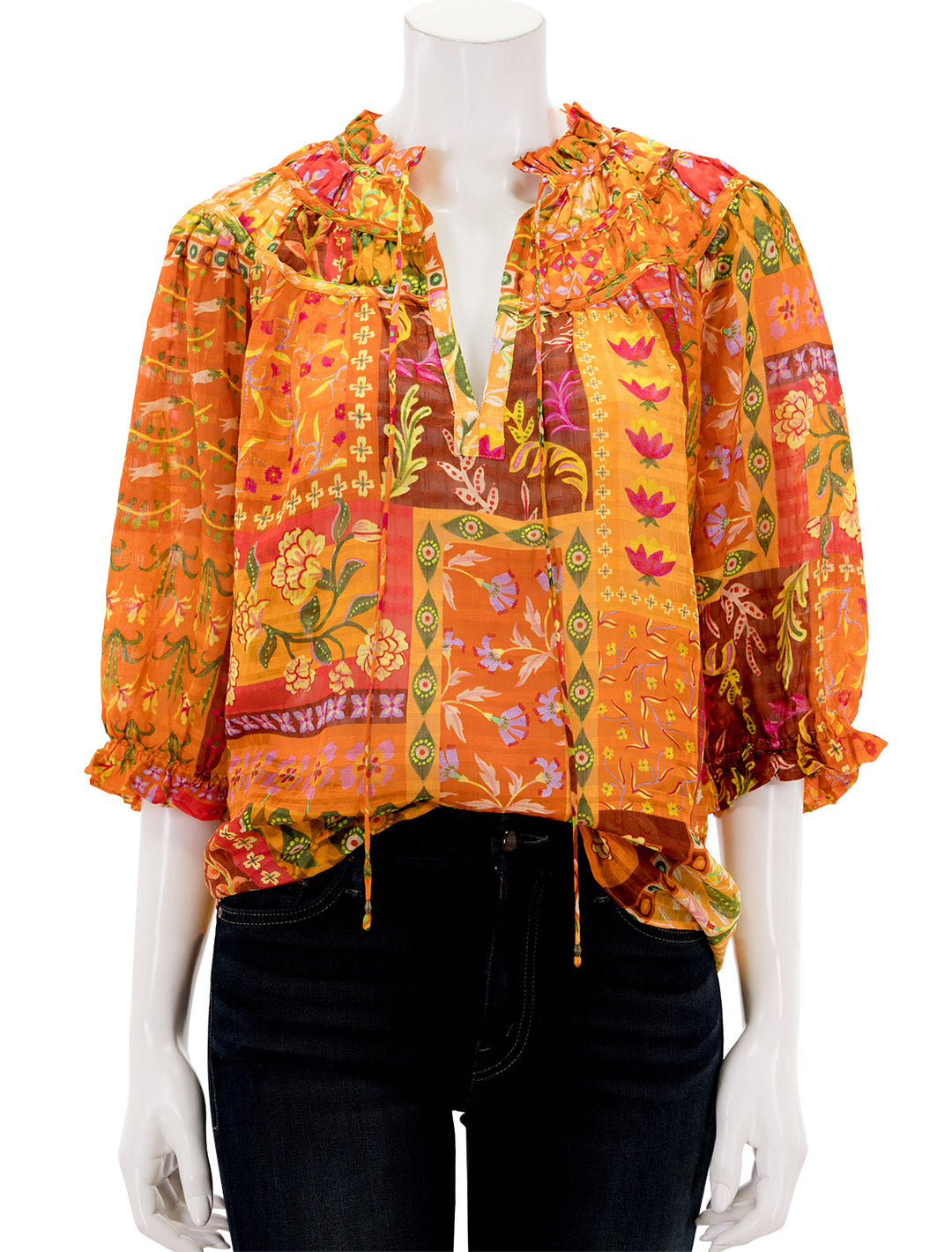 Front view of Marie Oliver's finley top in poppy patchwork.