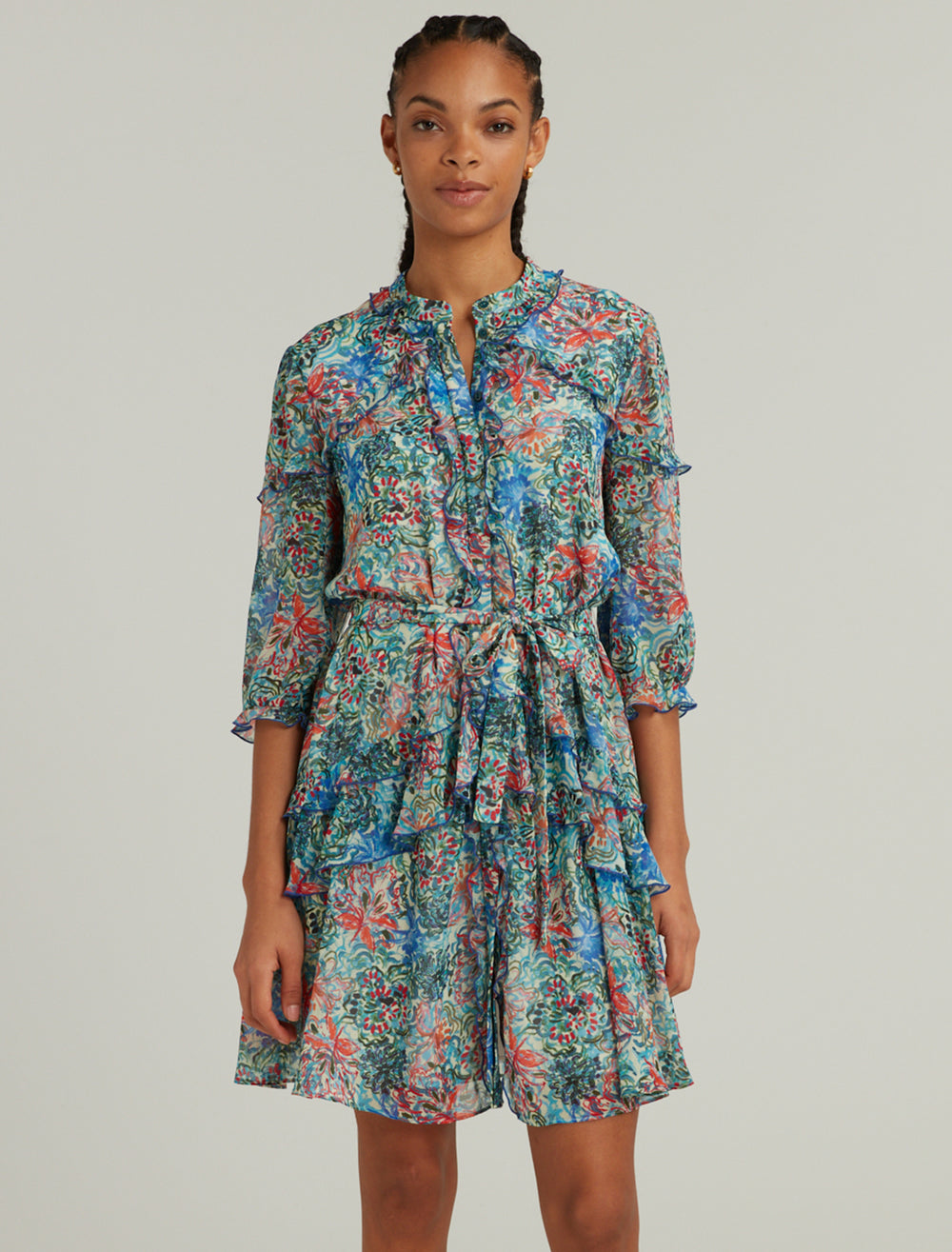 Model wearing Saloni's tilly ruffle dress in orchard sage.