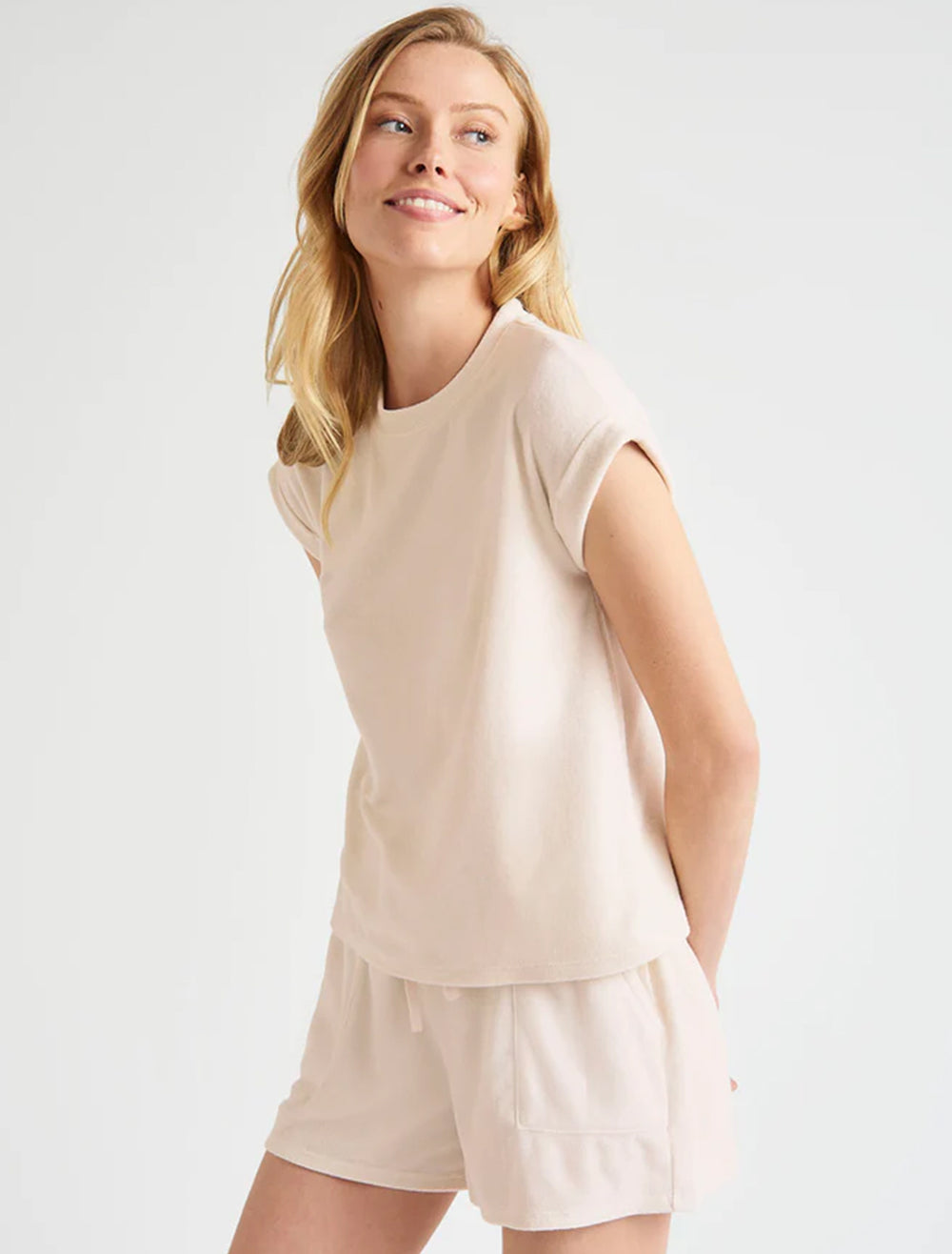 Model wearing Splendid's towel terry sweatshirt in moonstone.