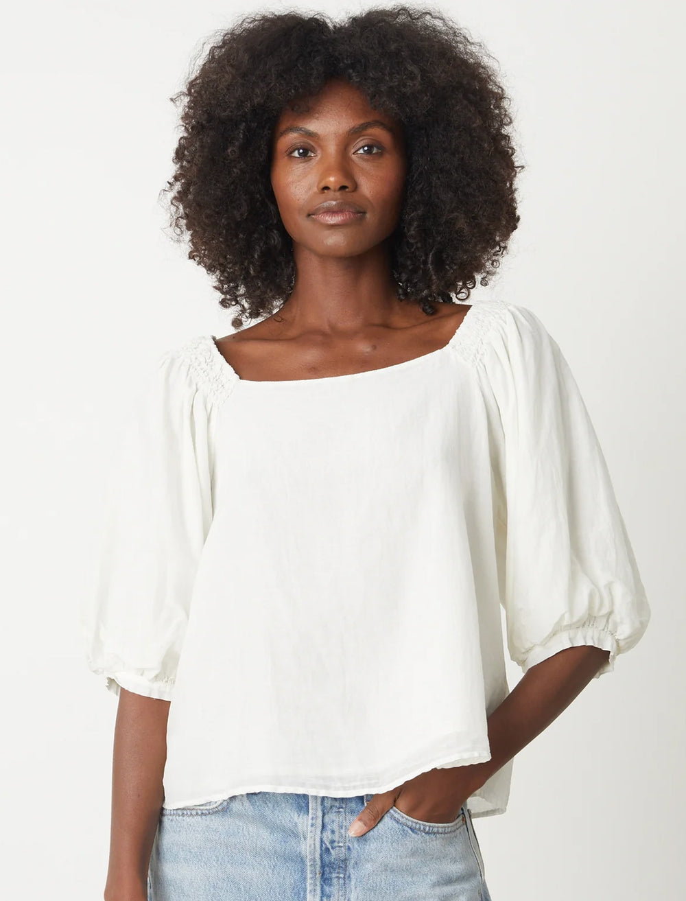 Model wearing Velvet's jolene top in ecru.