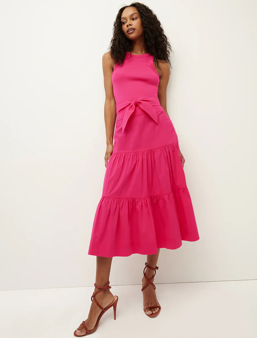 Model wearing Veronica Beard's austyn dress in fuchsia.