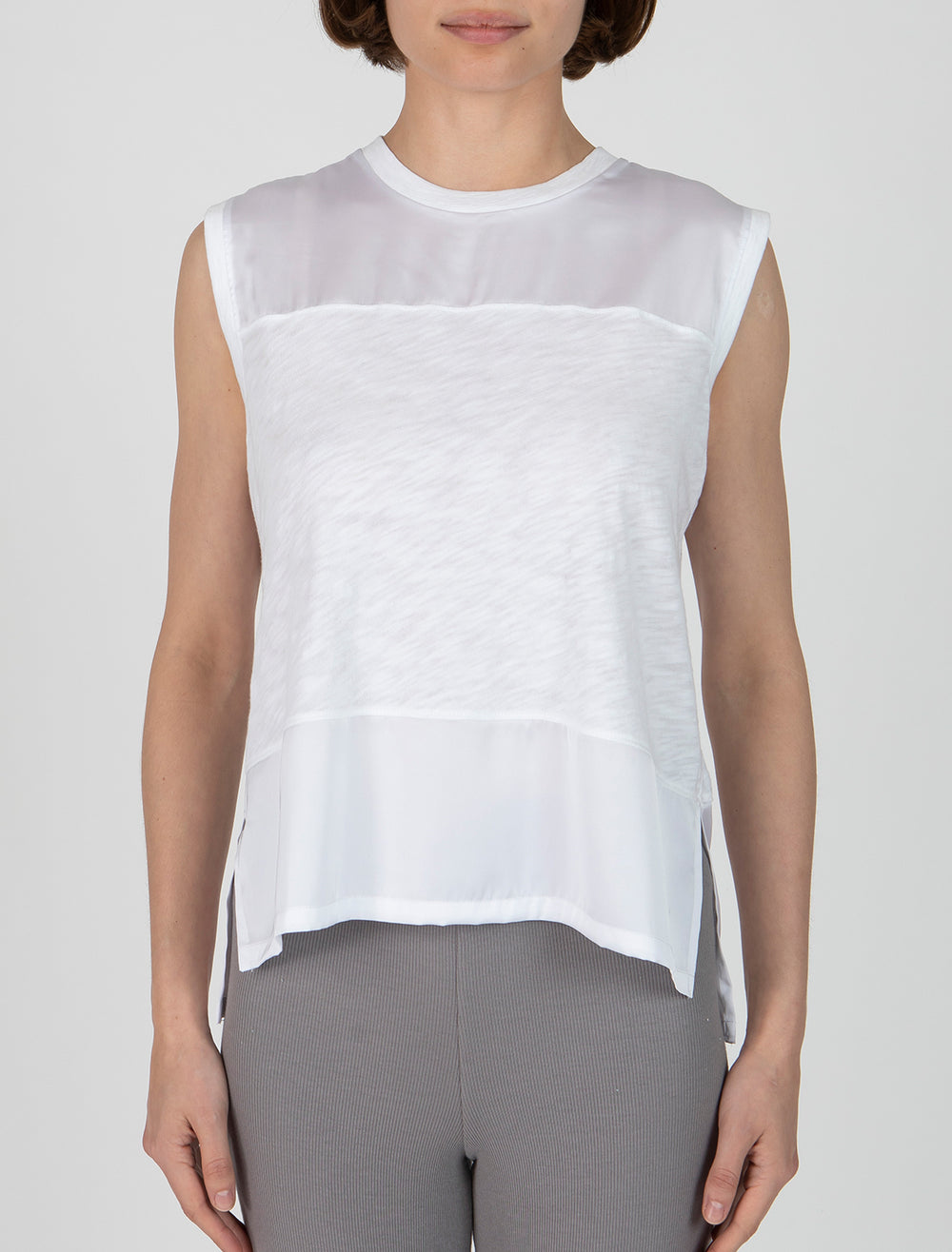 Model wearing ATM's slub jersey mixed media top in white.