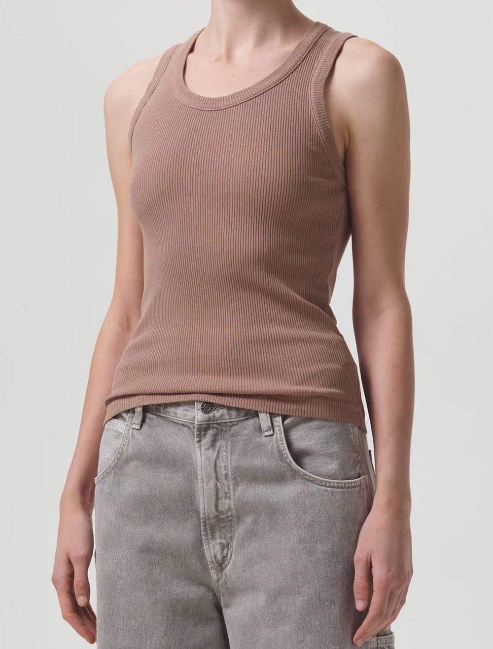 Model wearing AGOLDE's poppy tank in truffle.