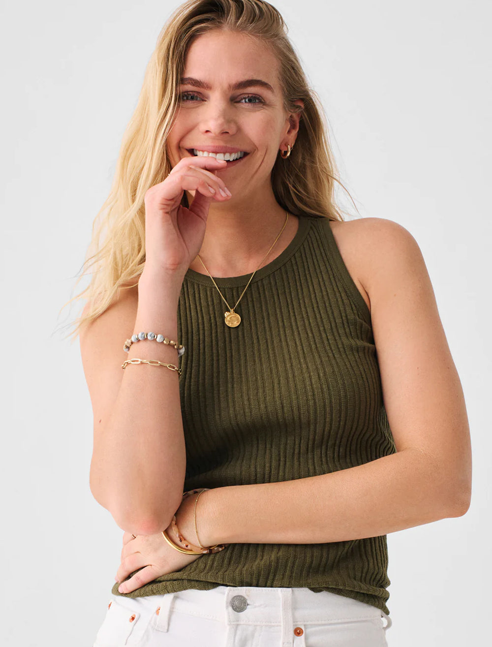 Model wearing Faherty's cambria rib tank in military olive.