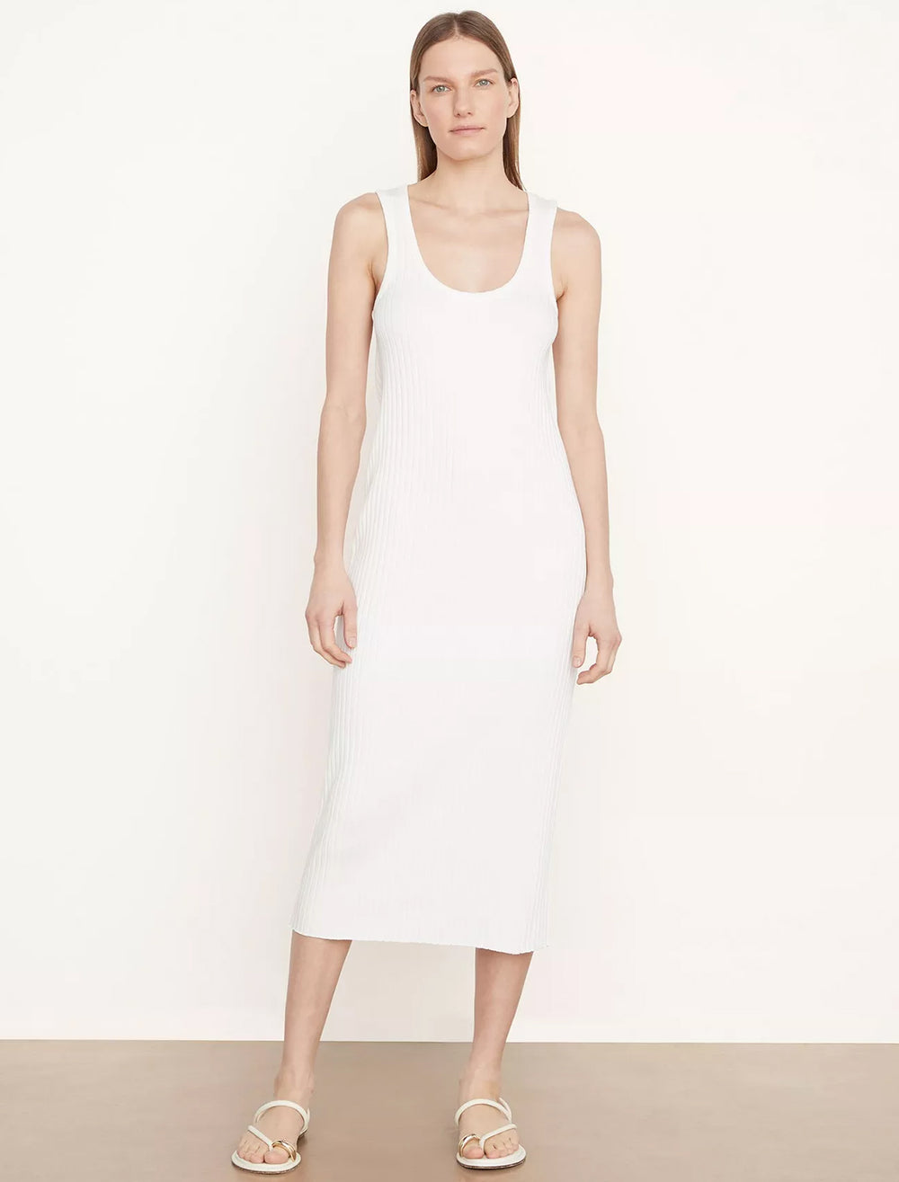 Model wearing Vince's rib scoop neck dress in off white.