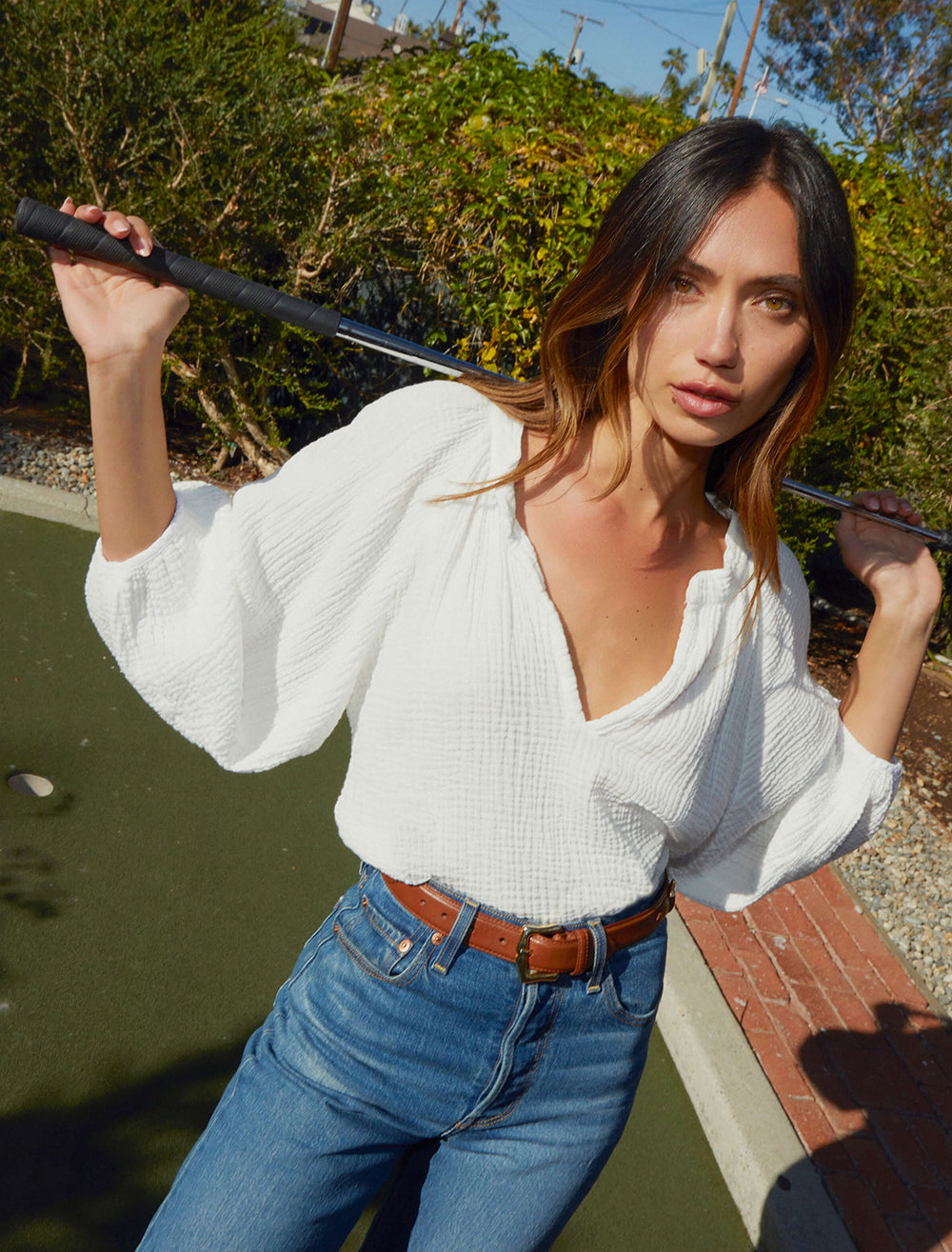 Model wearing Nation LTD's mimi romance top in white.