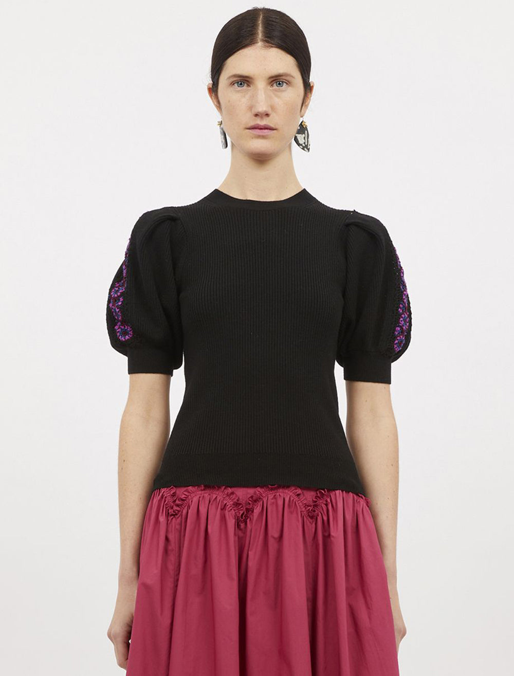 Model wearing Ulla Johnson's harper top in noir.
