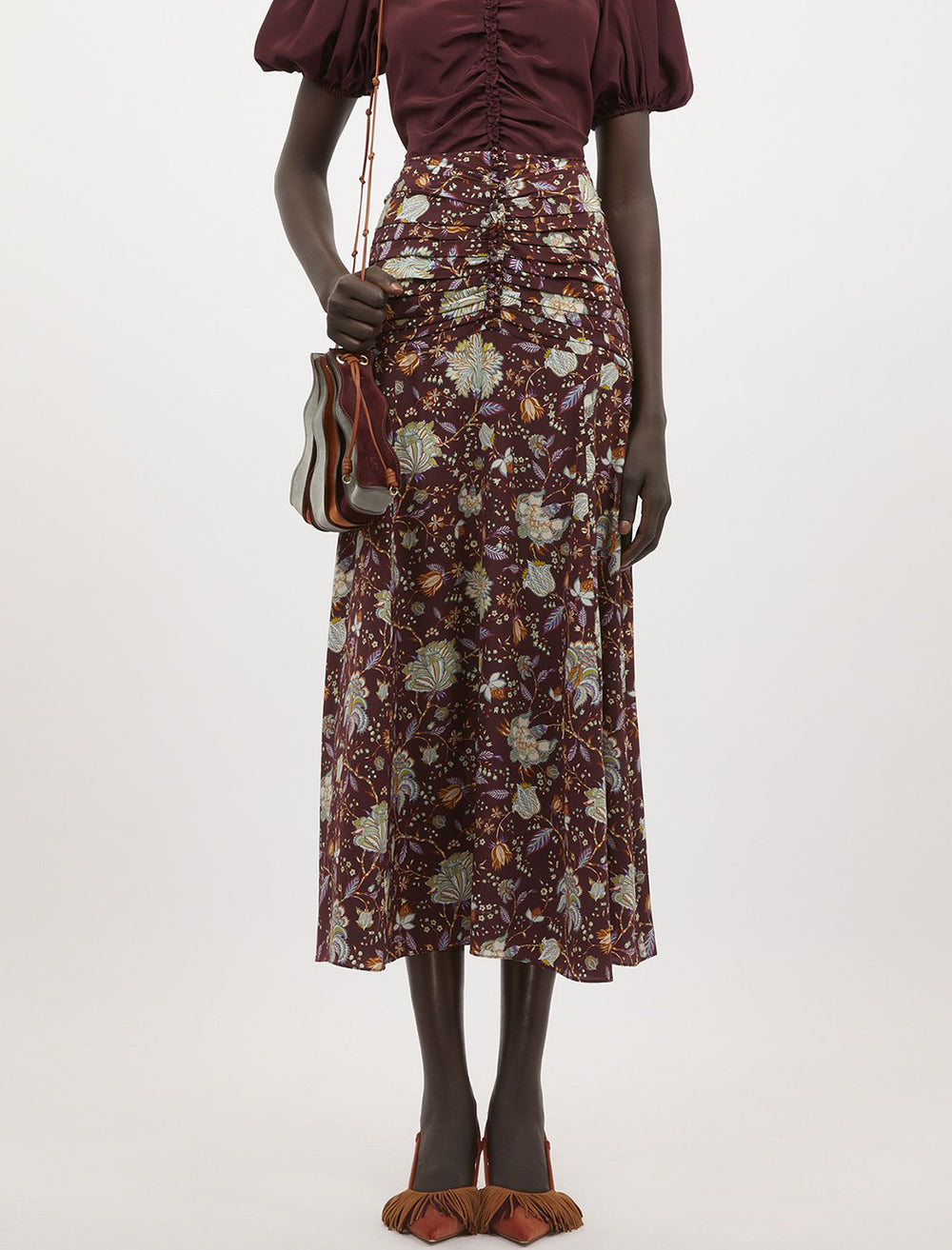 Model wearing Ulla Johnson's imani skirt in heliotrope.