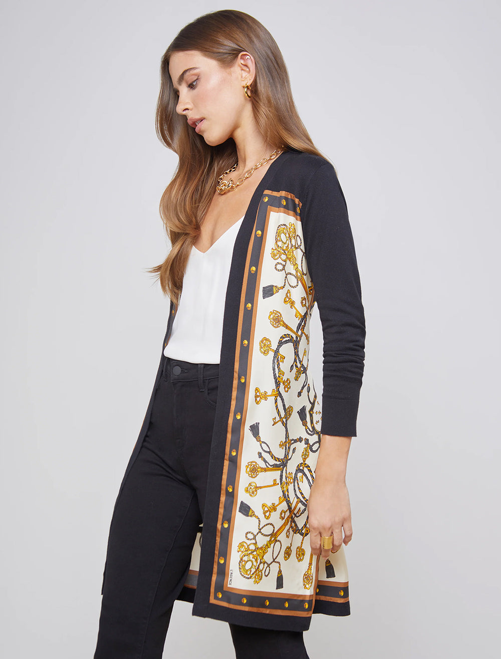 Model wearing L'agence's beverly silk panel cardigan.