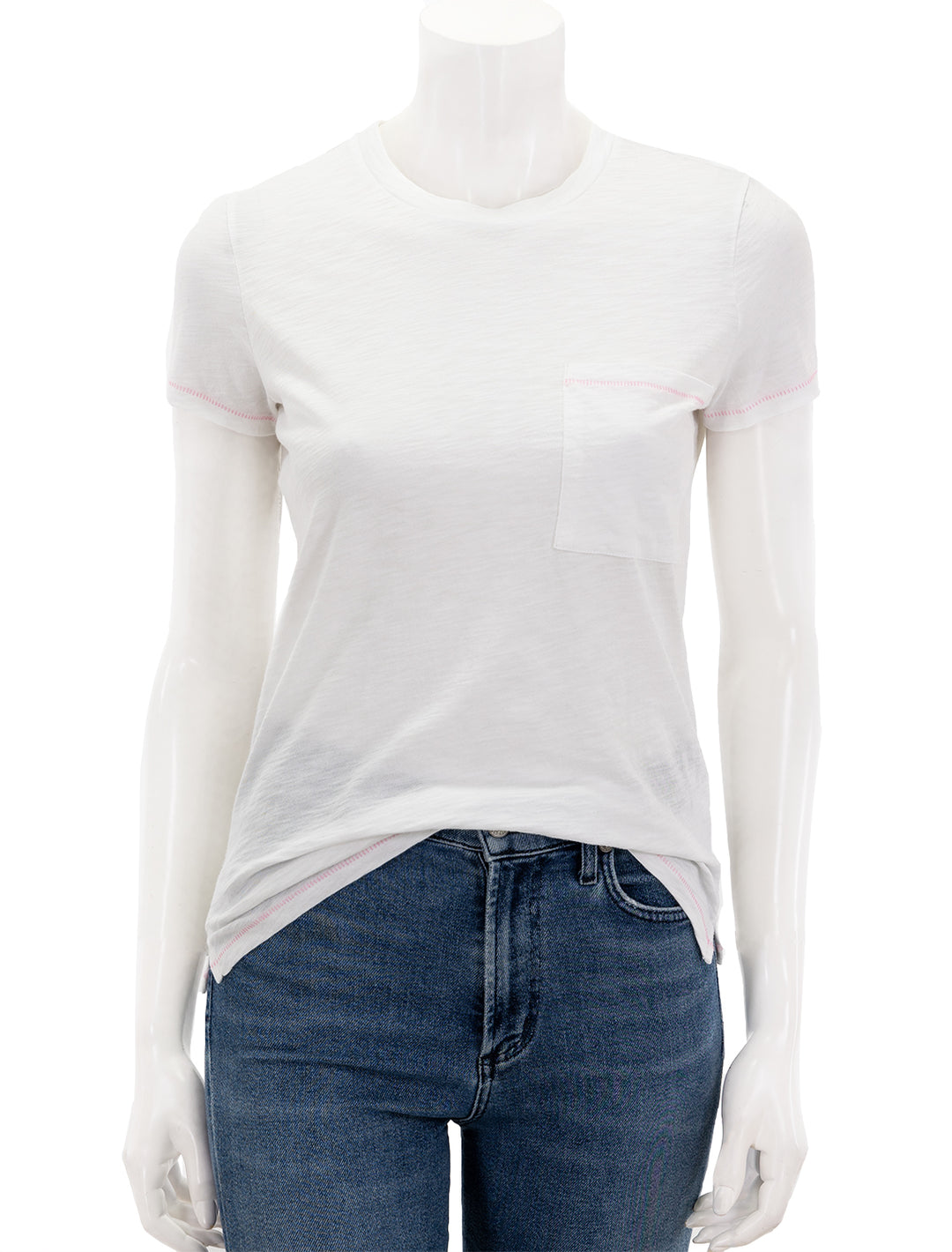 Front view of Goldie Lewinter's contrast stitch pocket boy tee in white and pink.