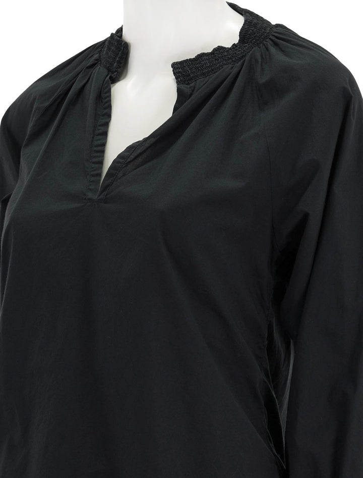 Close-up view of Nation LTD's estelle peasant blouse in black.