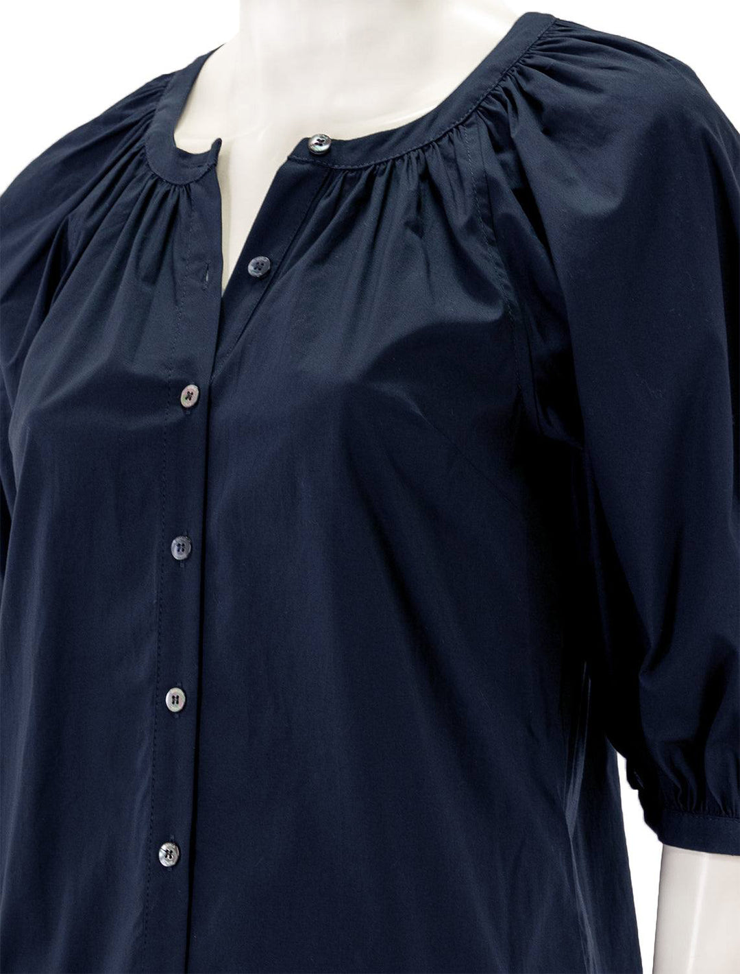 Close-up view of STAUD's mini vincent dress in navy.
