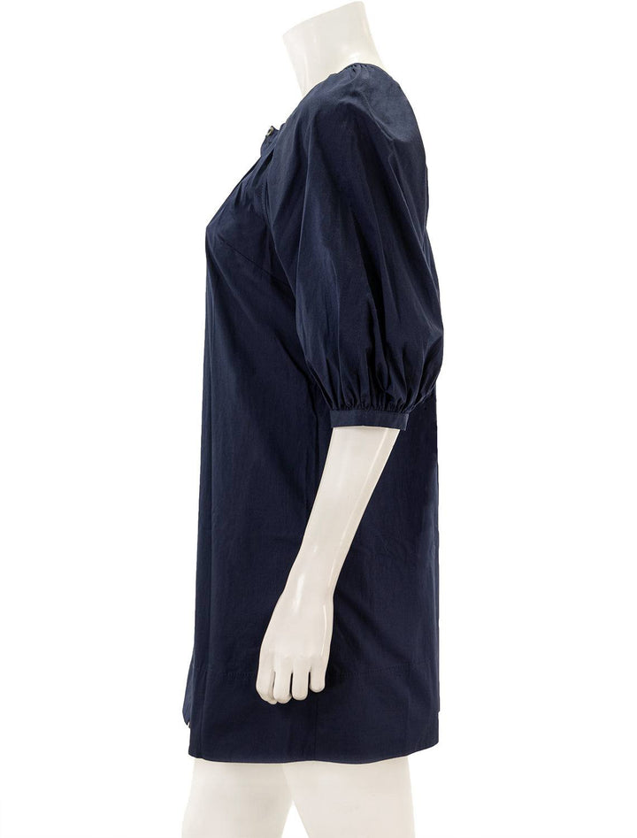 Side view of STAUD's mini vincent dress in navy.