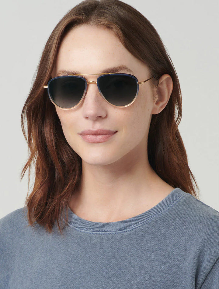 Model wearing Krewe's coleman 18k + matte grey indigo fade + gravity.