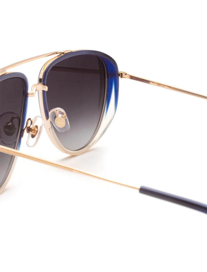 Close-up view of Krewe's coleman 18k + matte grey indigo fade + gravity.