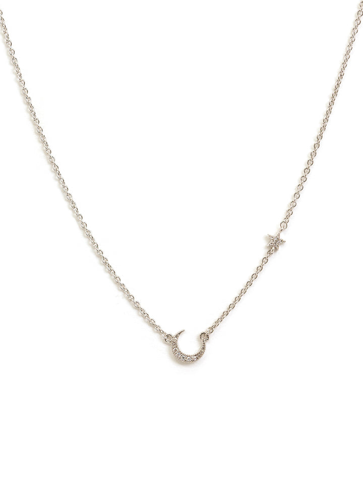 Front view of Tai Jewelry's moon and star with cz silver necklace.