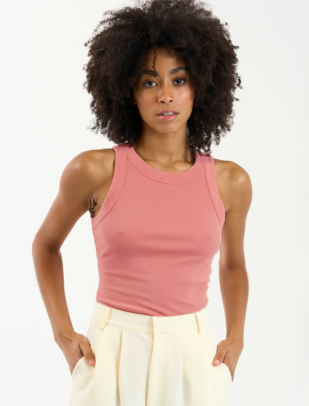 Model wearing Sundays NYC's turner tank in dusty rose.