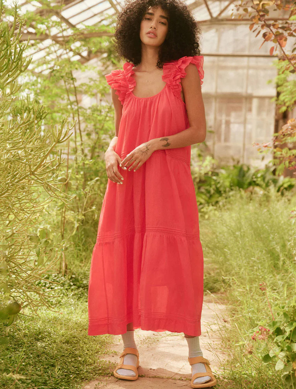Model wearing The Great's the dove dress in tart.