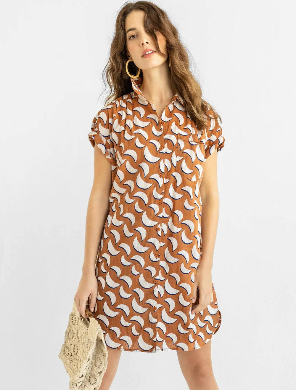 Model wearing Lilla P.'s short sleeve shirt dress in adobe print, styled without the tie waist belt.