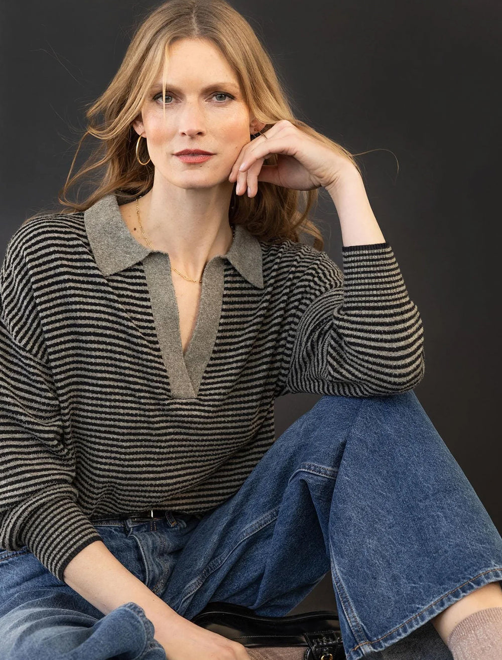 Model wearing Lilla P.'s easy polo sweater.