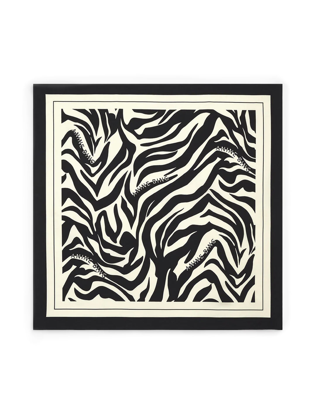 Overhead view of Anine Bing's evelyn scarf | black and cream zebra.