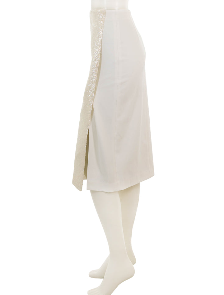 Side view of Saint Art's Celine Midi Wrap Skirt in Ivory Sequin.
