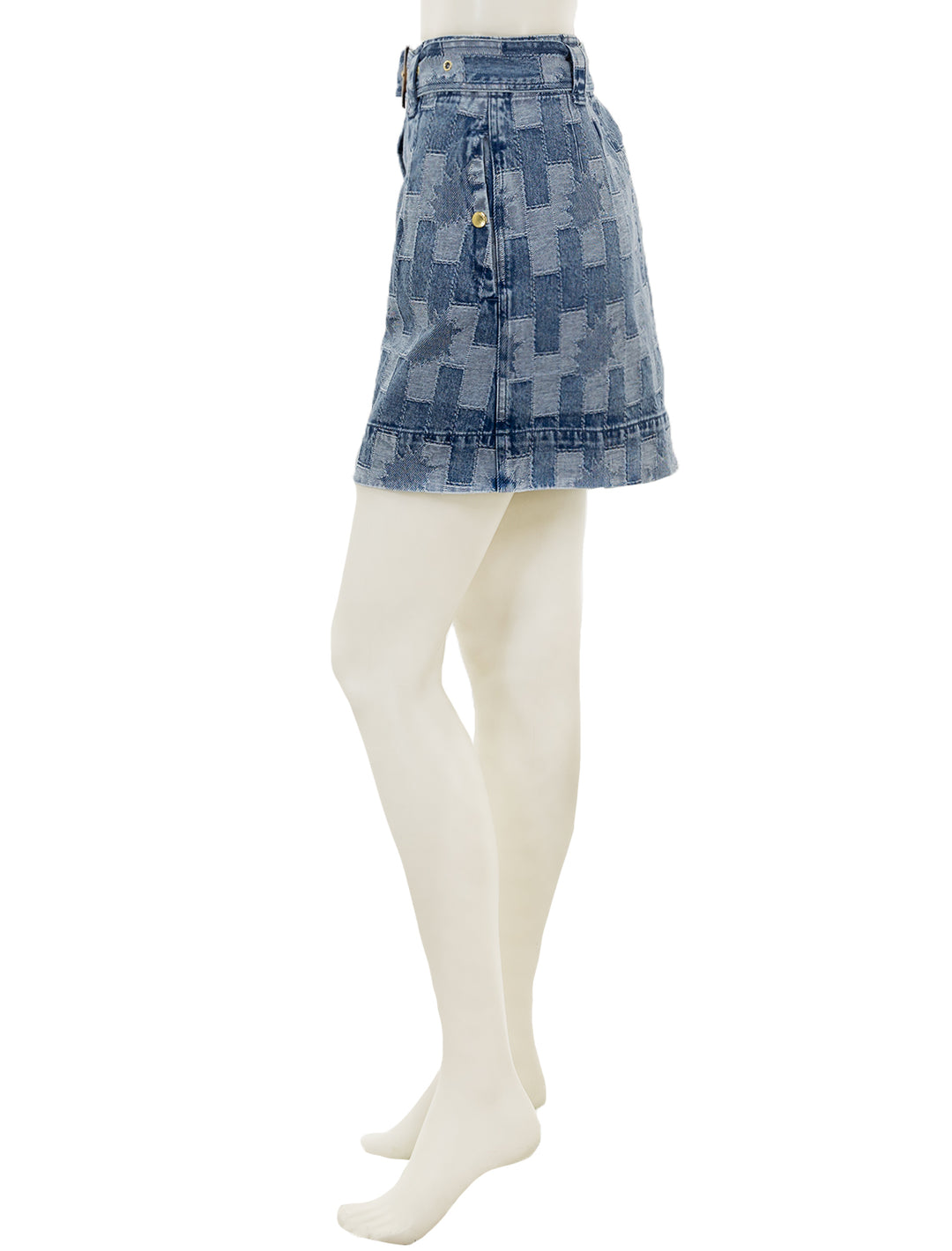 Side view of Barbour's bowhill mini skirt in patchwork denim.