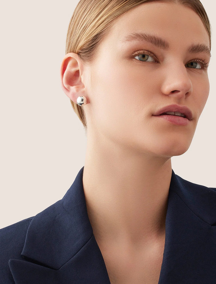 model wearing aurora studs in silver
