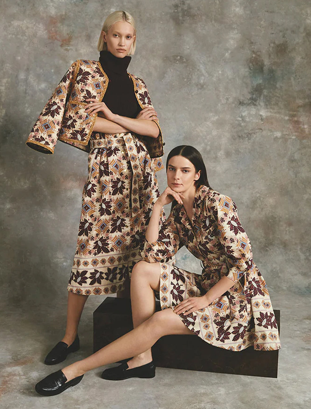 Model wearing Cara Cara's leona dress in retro floral.
