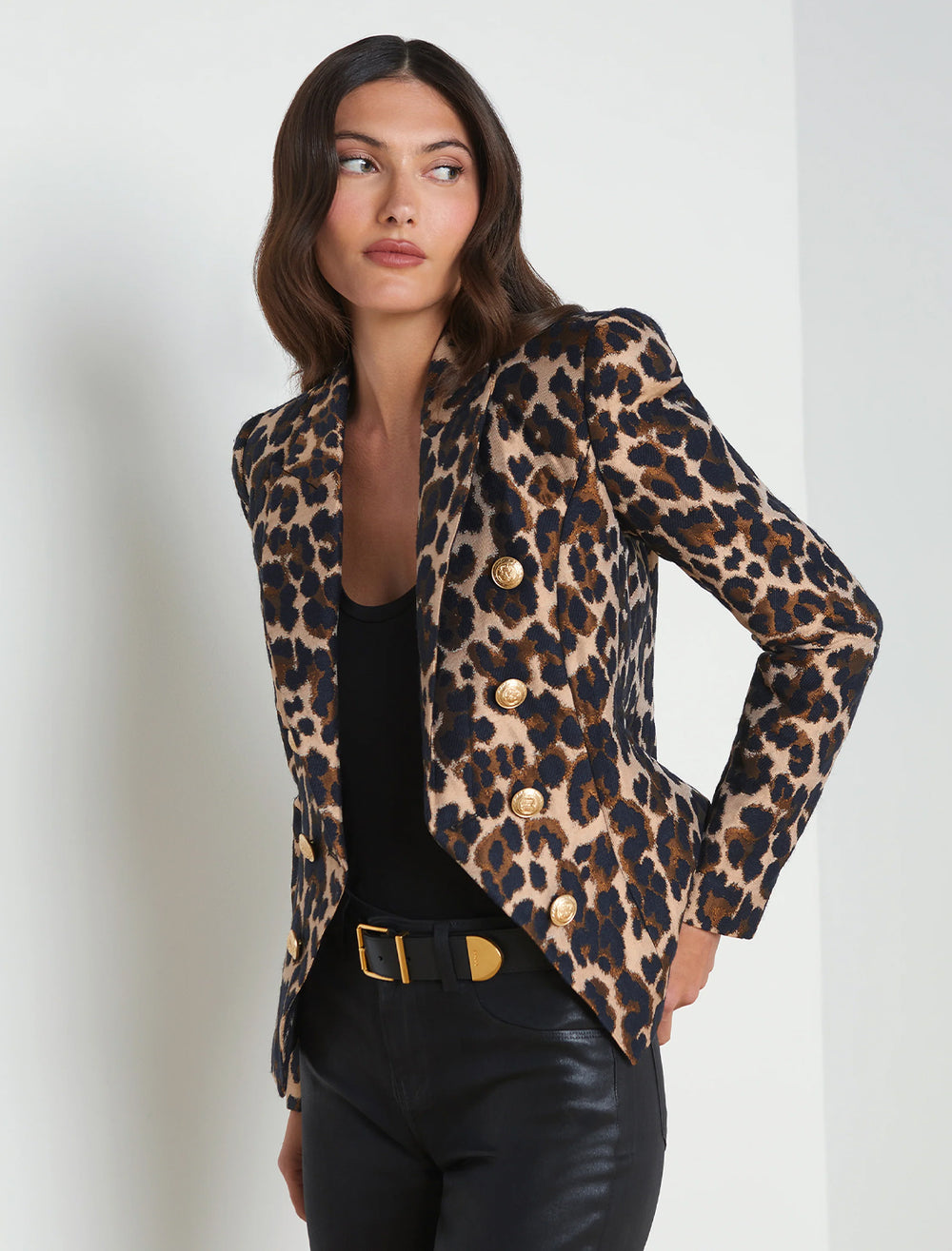 Model wearing L'agence's bethany structured blazer in cashew leopard jacquard.