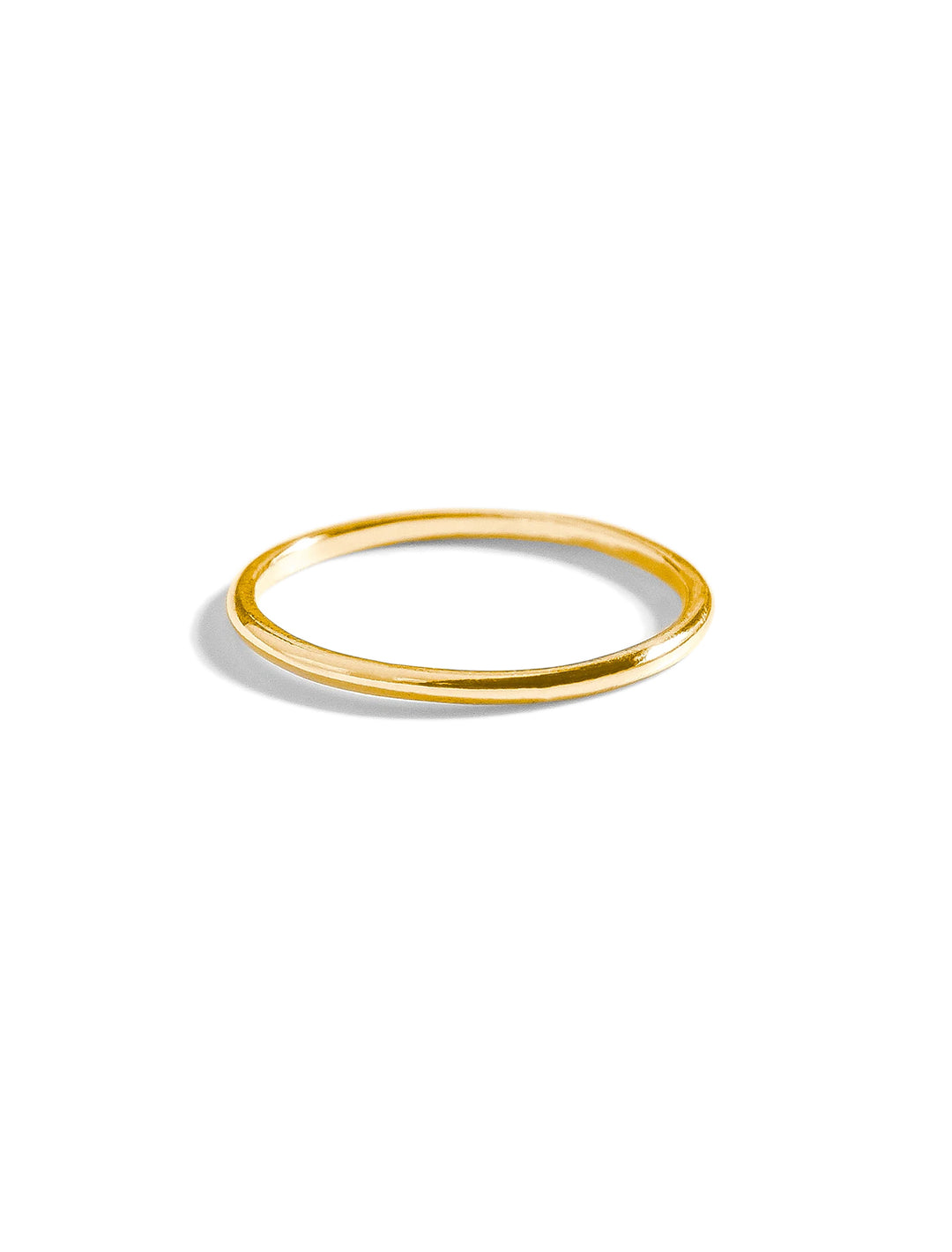 Front view of THATCH's 14k gold plated dainty stacking ring.