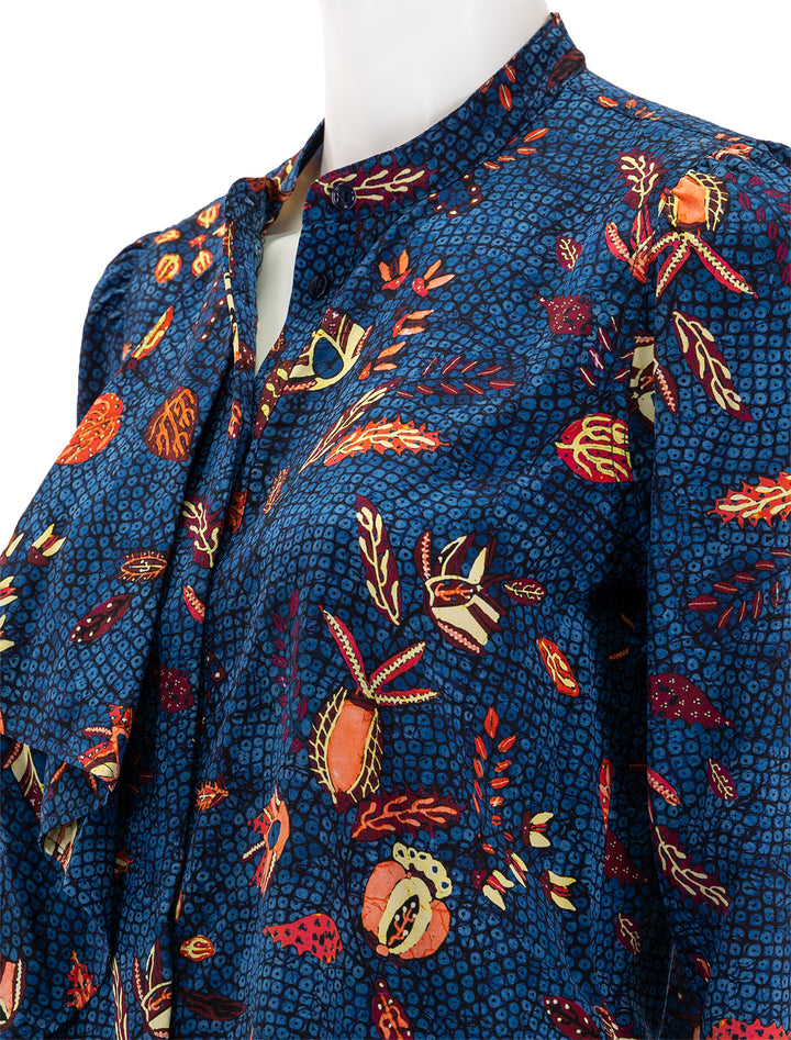 Close-up view of Ulla Johnson's ashlyn blouse in blue dahlia.