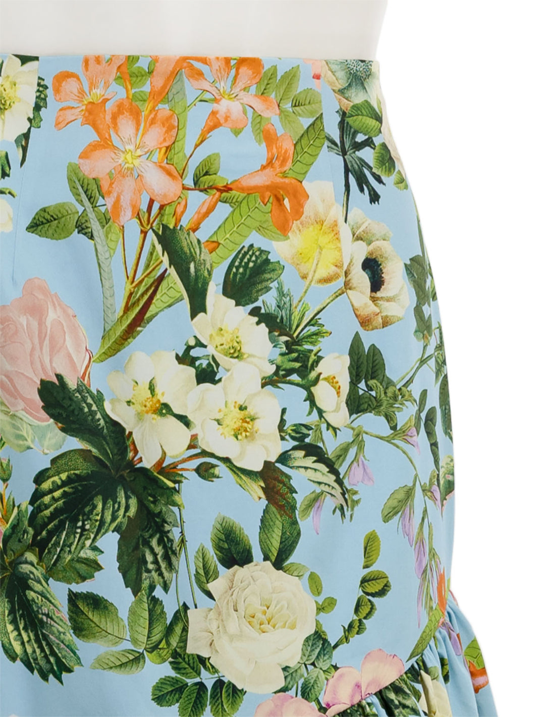 Close-up view of Cara Cara's perla skirt in light blue kingston floral.