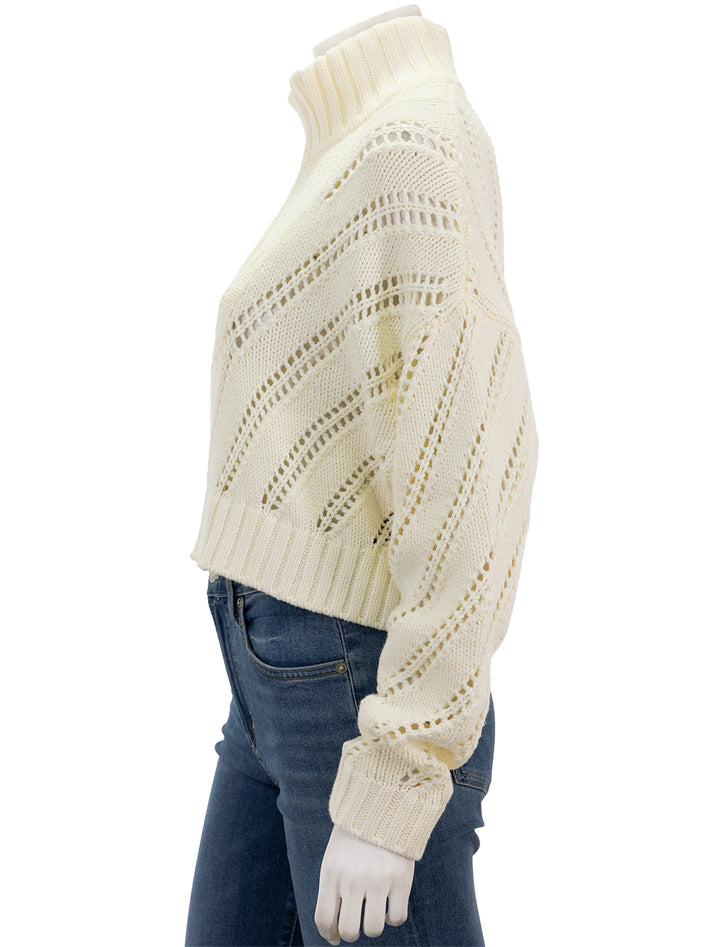 Side view of STAUD's Cropped Hampton Sweater in Ivory Pointelle.