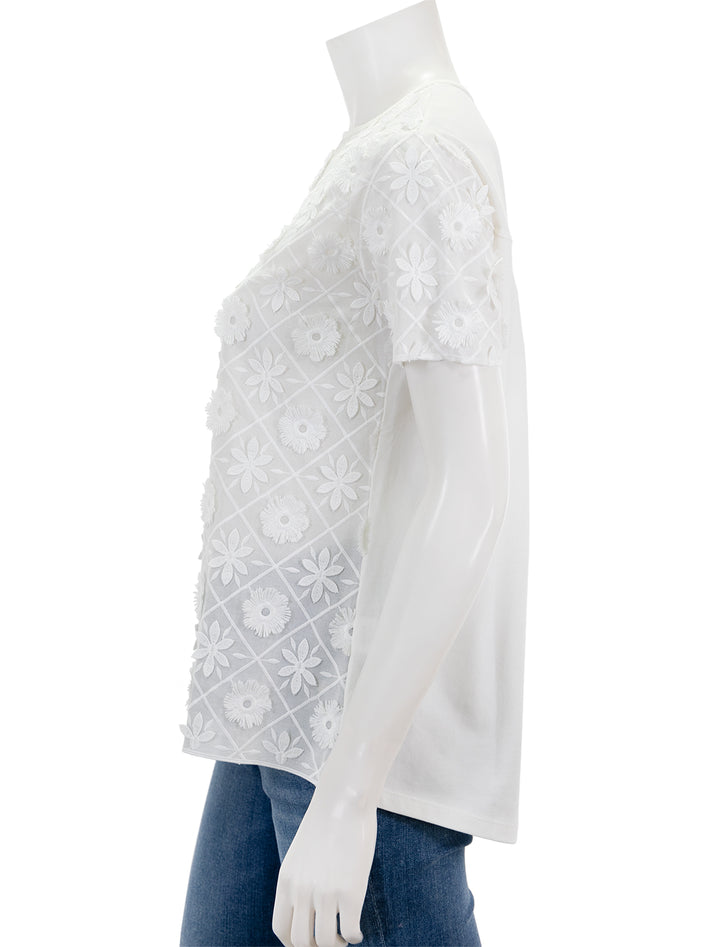 Side view of Vilagallo's darzie top in ivory.