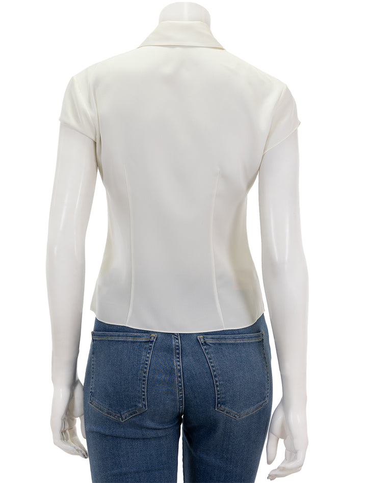 Back view of Theory's cap sleeve blouse in ivory.
