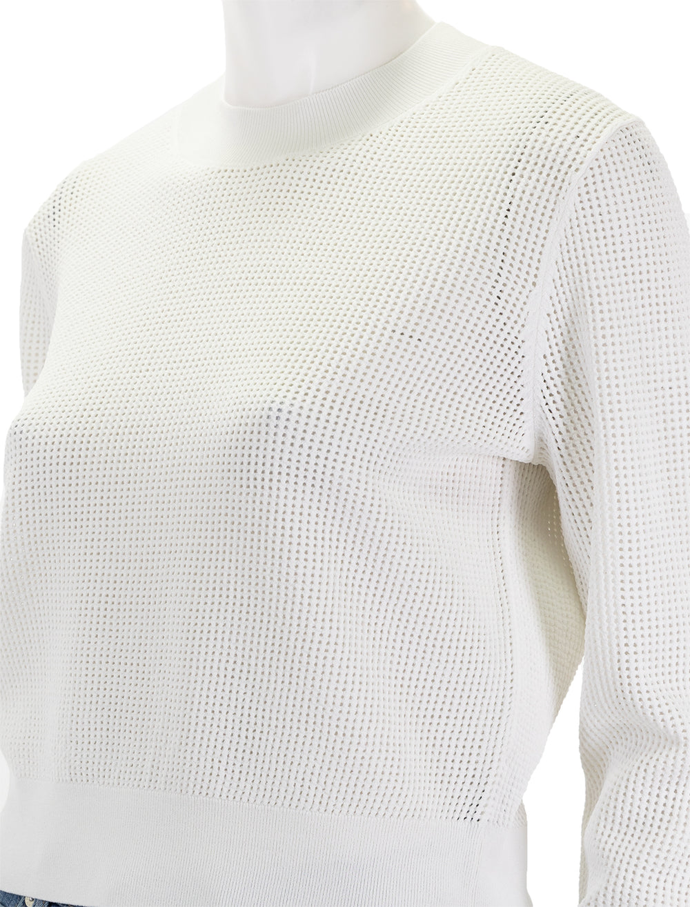 Close-up view of Theory's pointelle pullover in white.