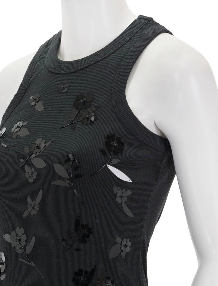 Close-up view of GANNI's rib jersey embellished tank.