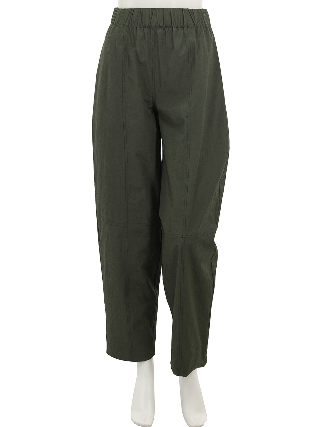 Front view of GANNI's curve pant in kombu green.