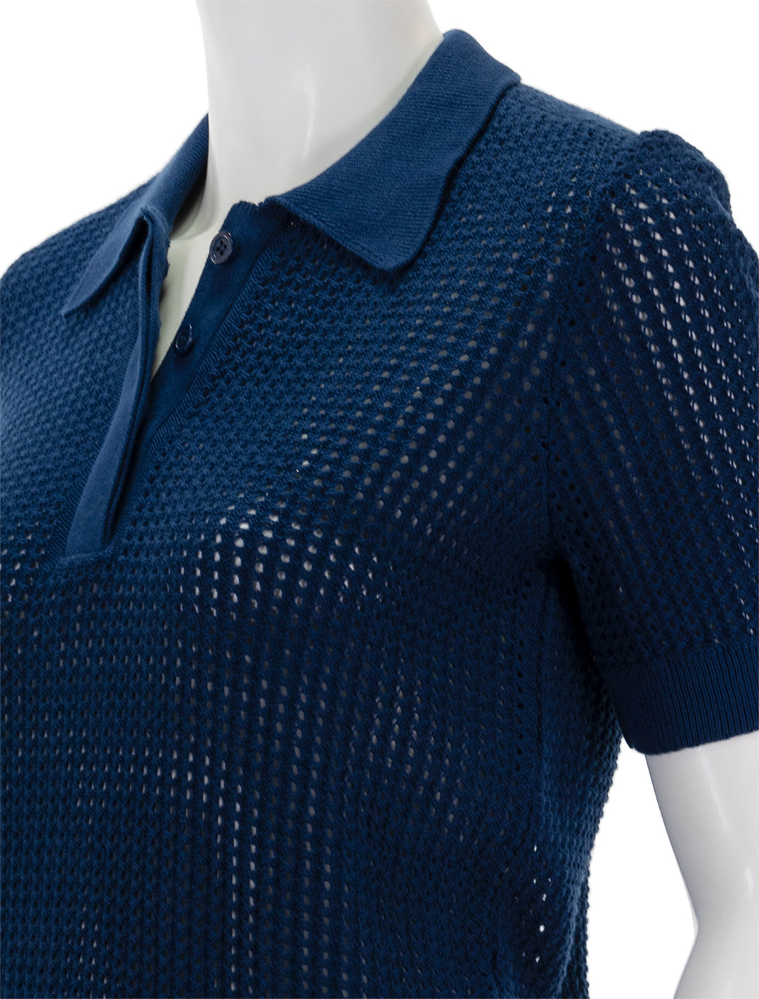 Close-up view of Clare V.'s augustine polo in cobalt.