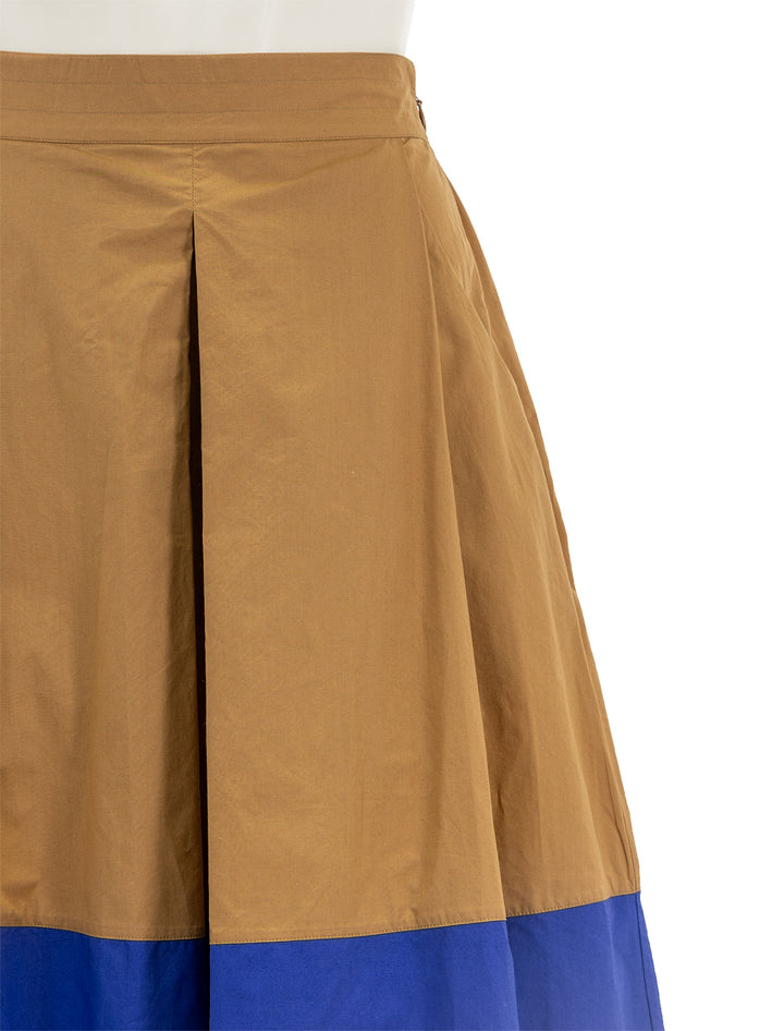 Close-up view of Clare V.'s genevieve skirt in khaki and cobalt.