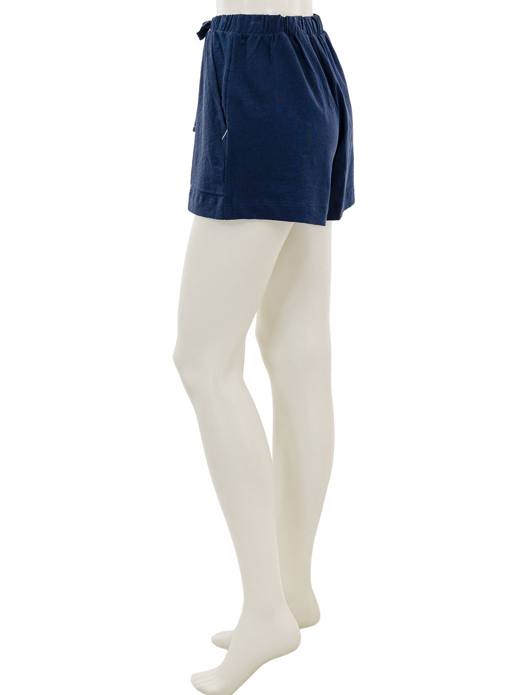 Side view of Lilla P.'s elastic waist drawstring shorts in navy.