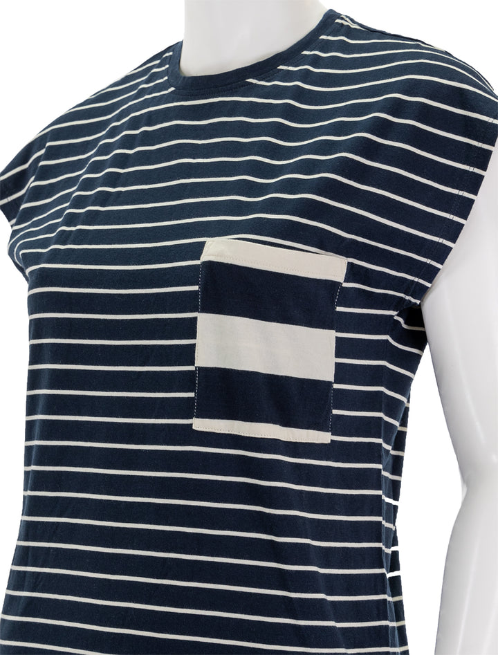 Close-up view of KULE's the honor dress in navy and cream stripe.