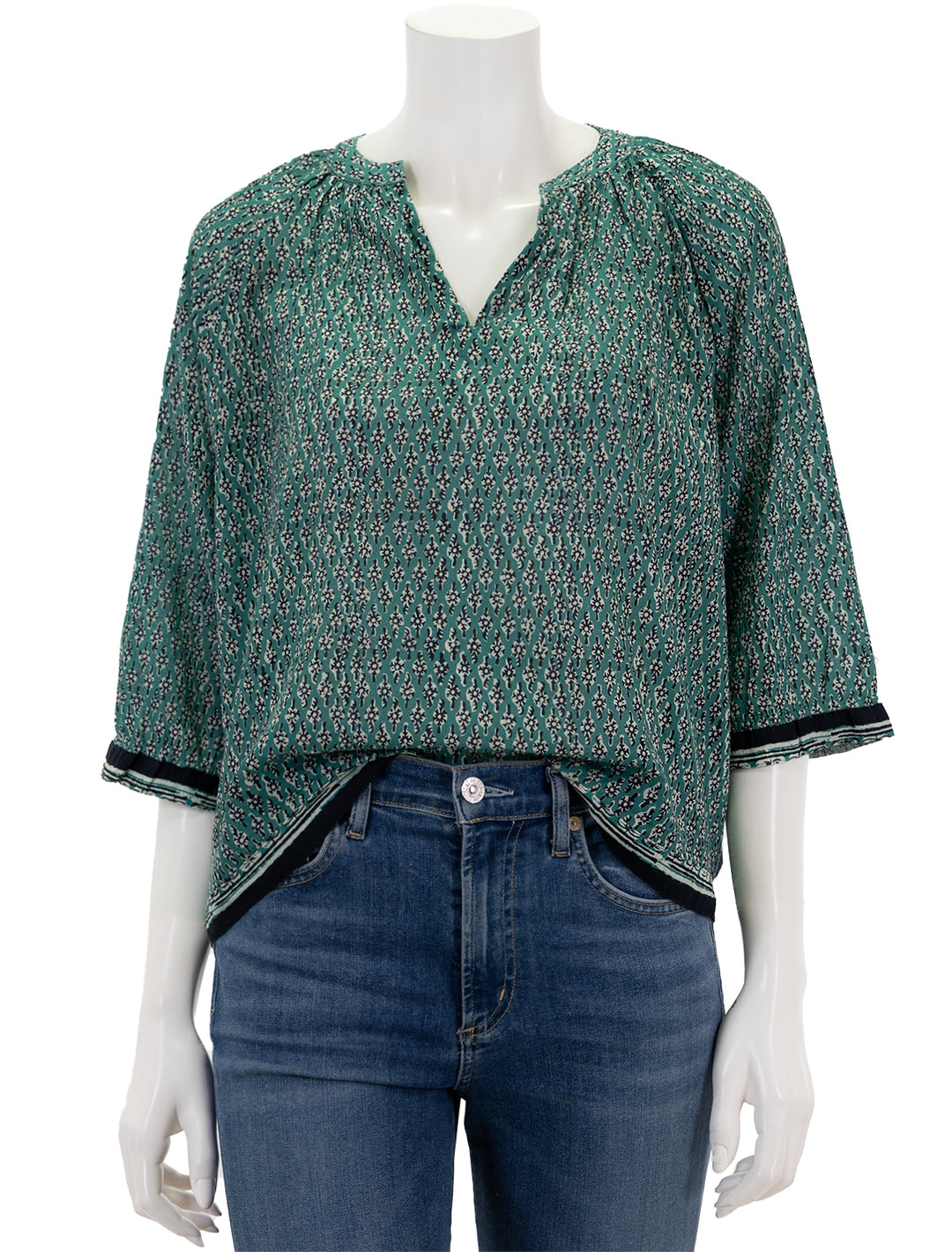 Front view of MABE's mari print top in green.