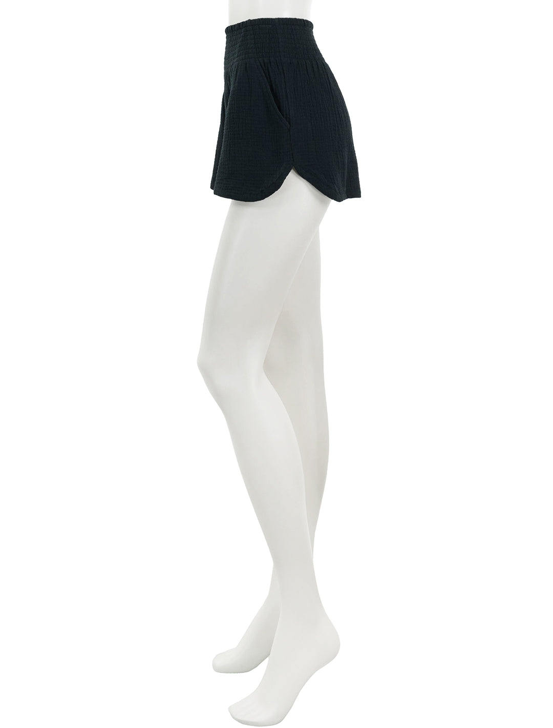 Side view of Marine Layer's corine shorts in black.