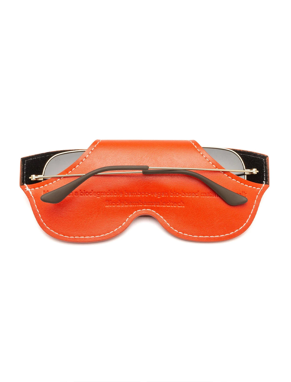 Back view of Caddis' net fit eyeware case in vermillion.