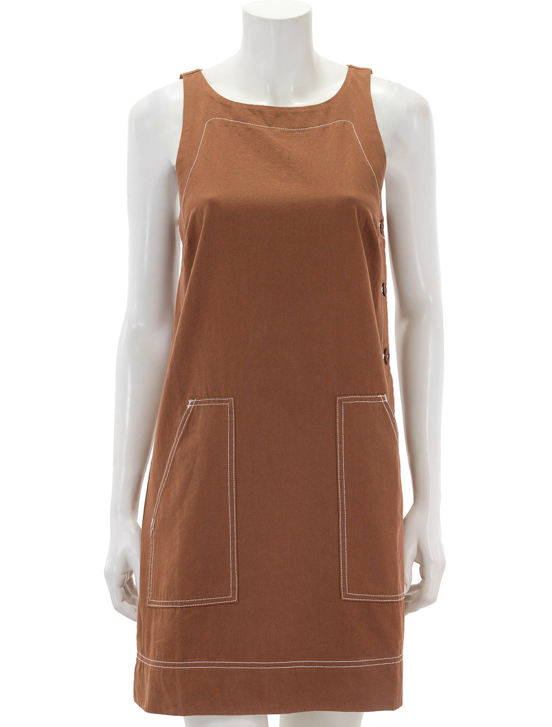 front view of side button canvas dress in bronze