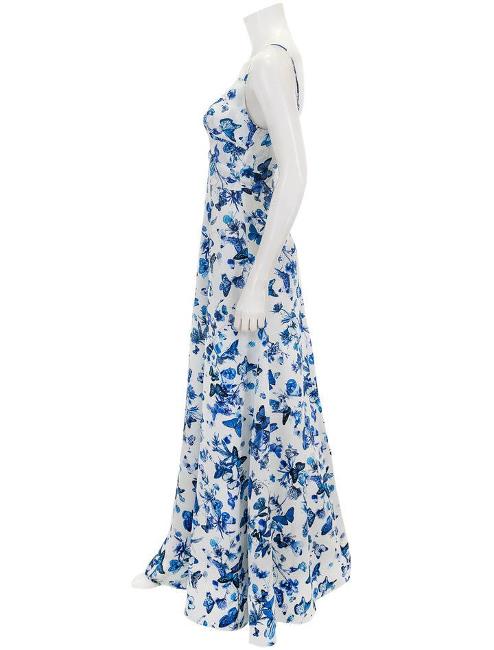 Side view of L'agence's porter twisted front dress in white and blue.